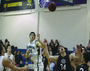 Men top Brandeis, fall to No. 16 NYU on Throwback Weekend
