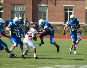 Football takes on Battling Bishops under the lights
