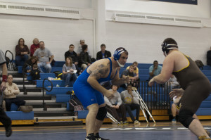 English, Hall named All-UAA, wrestlers third at conference championships