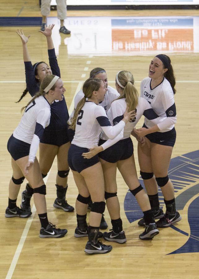The Volleyball team celebrates last season after a kill. The Spartans had a lot to celebrate as they swept their four games this weekend so start the season 5-0.