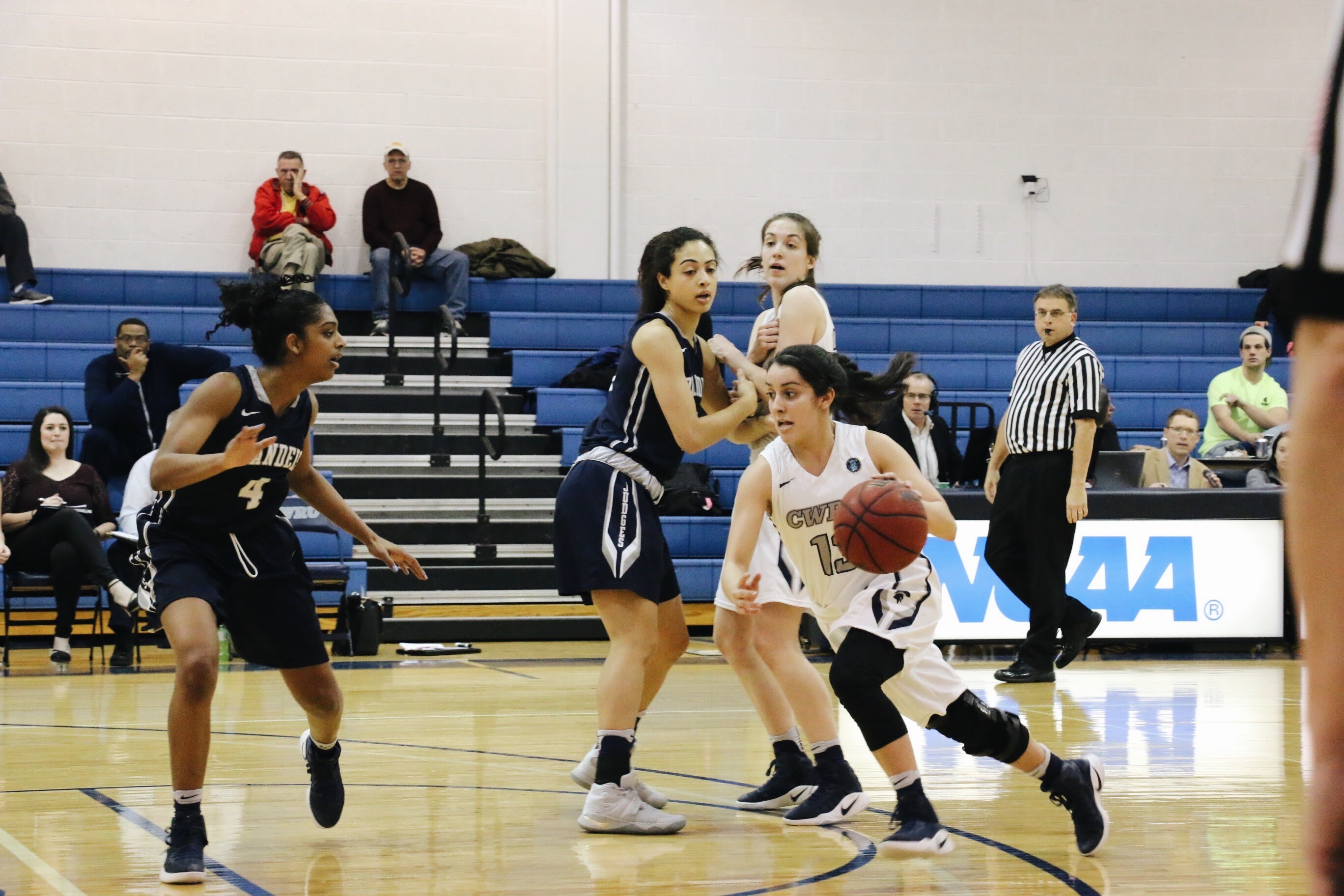 Alicia Marie Gonzales drives off of a pick from a helpful teammate on her way to the basket.