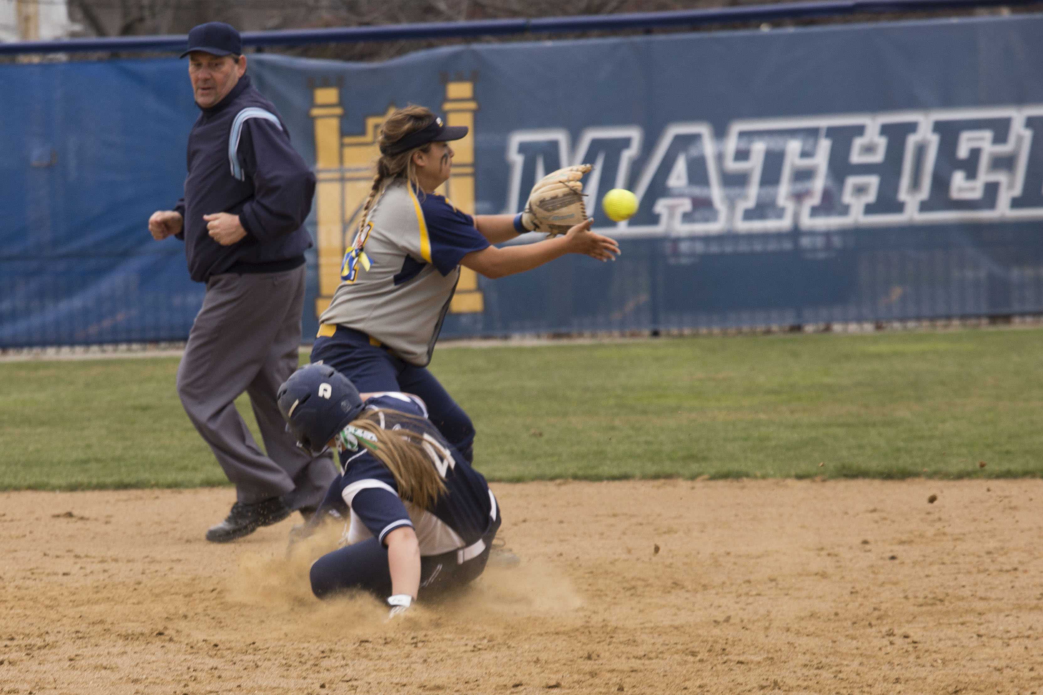 Nicole Doyle slides safely into second base during the Spartans’ game against Emory University.