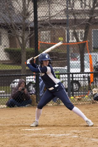 Softball splits six