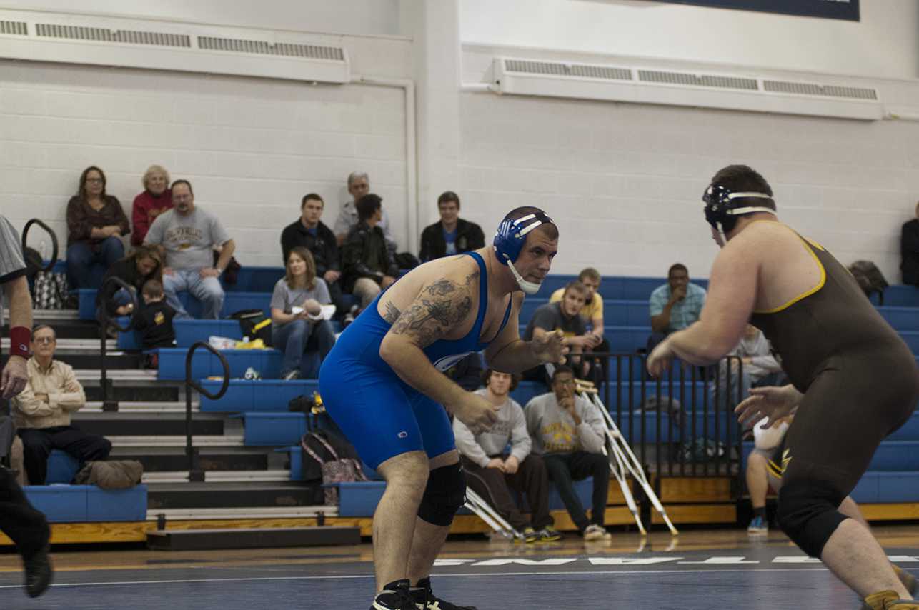 English, Hall named All-UAA, wrestlers third at conference championships