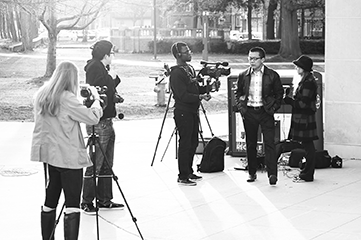 Donald Qiao, founder and president of independent student group Case TV, interviews unsuspecting students.