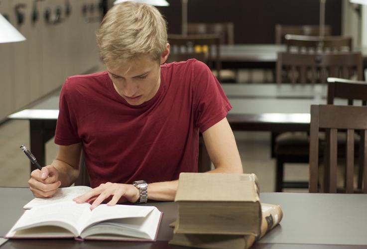 A student studies in the Judge Ben C. Green Law Library. The CWRU school of law will be making sweeping changes to its curriculum next school year to better prepare its graduates for an increasingly competitive job market.
