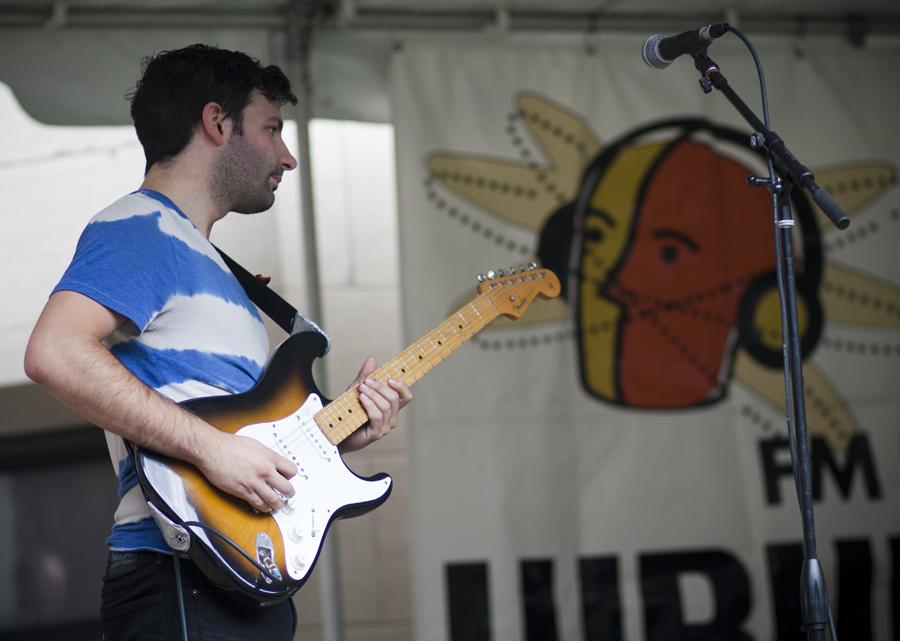 The guitarist of Wingtones began the daylong music festival around 1 p.m. on Sept. 8. Among other antics, Wingtones’ mascot Wingzilla graced the stage.