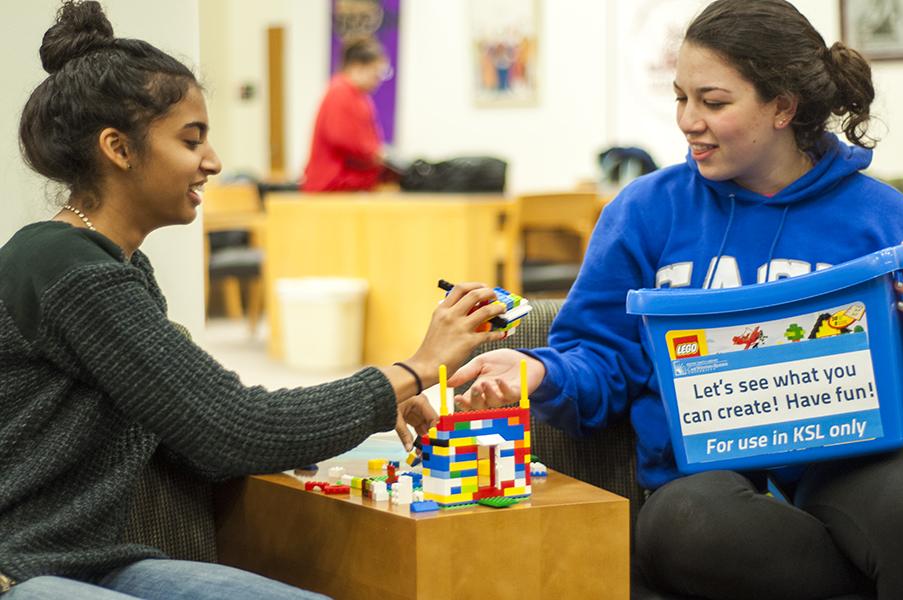 Two CWRU undergraduates play with Lego building blocks on Kelvin Smith Library’s second floor. The colorful, plastic building blocks have been a hit among students, with several students already requesting the library to add more.
