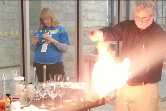 Presenter at MakerFaire 2013 demonstrates a chemical reaction. The annual event is free and open to the public.