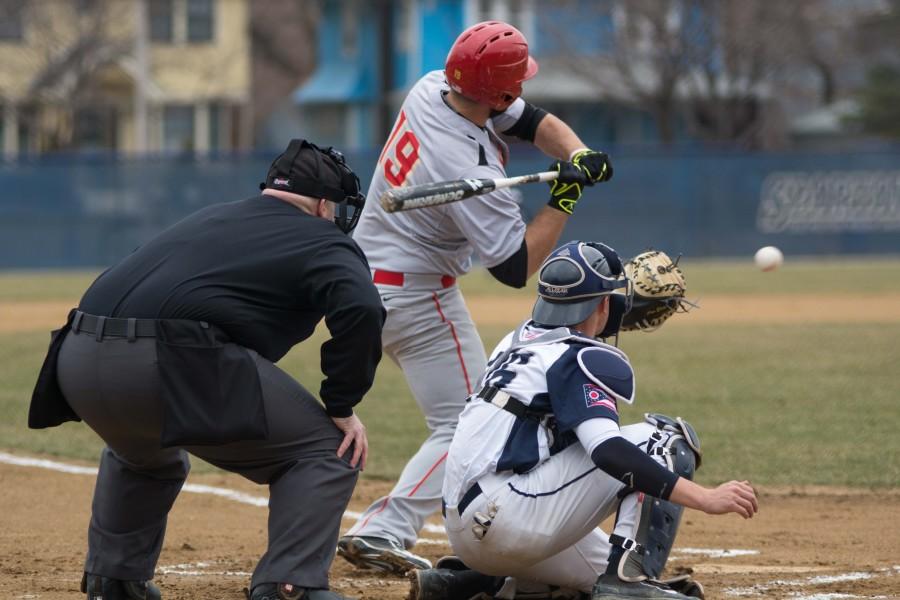 Sophomore Catcher Eric Eldred receives the pitch for a strike against the Otterbein batter. Eldred and the Spartans picked up their first win at home this season against Otterbein on Wednesday afternoon.