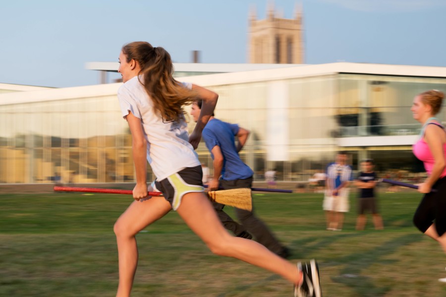 Two Cwrucio members sprint for the quaffle and bludgers at the center line. The experience of playing Quidditch erases any doubt of the game being considered as a sport.