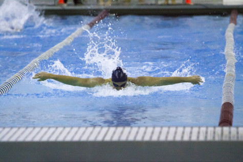 Spartan swimming speeds to win against John Carroll