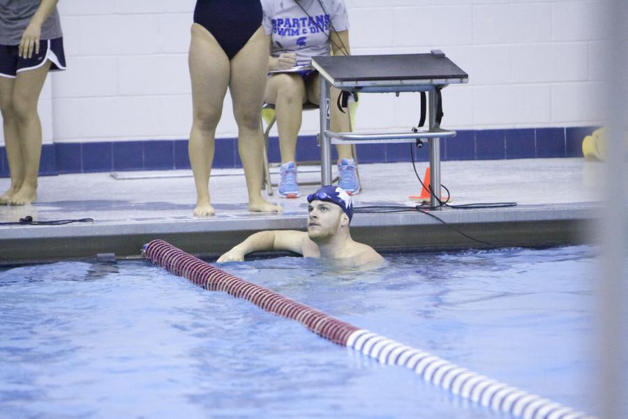 A Spartan swimmer looks up to see the race results. The results have been good as the Spartans continue to win on the road. 
