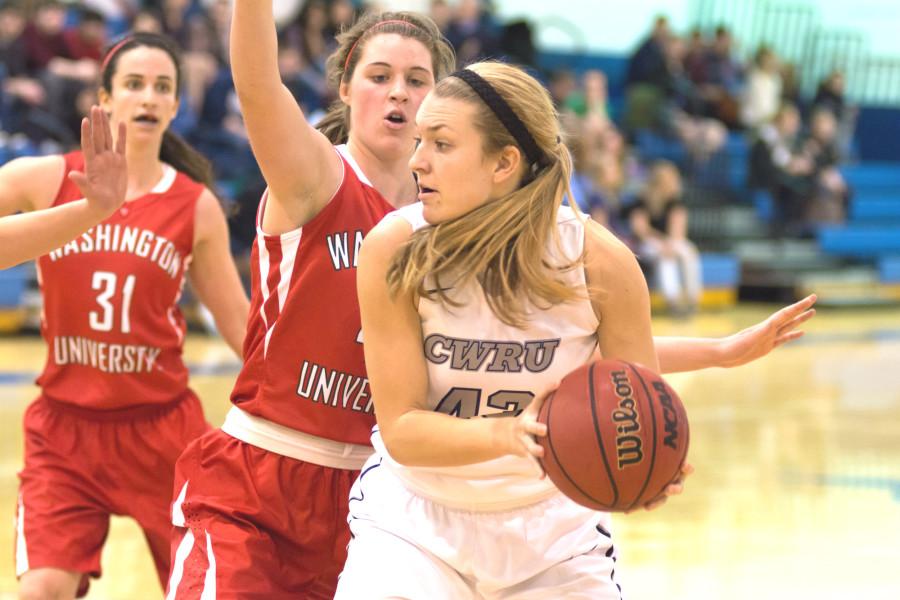 Spartans Laura Mummey looks for a teammate while under pressure earlier this season. Mummey helped boost the Spartans to their first UAA win this past weekend.
