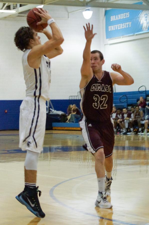 Spartan guard Javier Alvarez shoots over a University of Chicago defender, the Spartans return home and look to win the final three games of the season.
