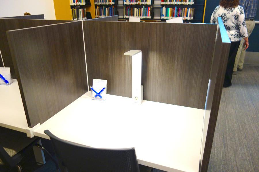 A cubicle in the newly renovated Lillian F. & Milford J. Harris Library in the Mandel School of Social Sciences. Graduate students often have more work near the semesters end.