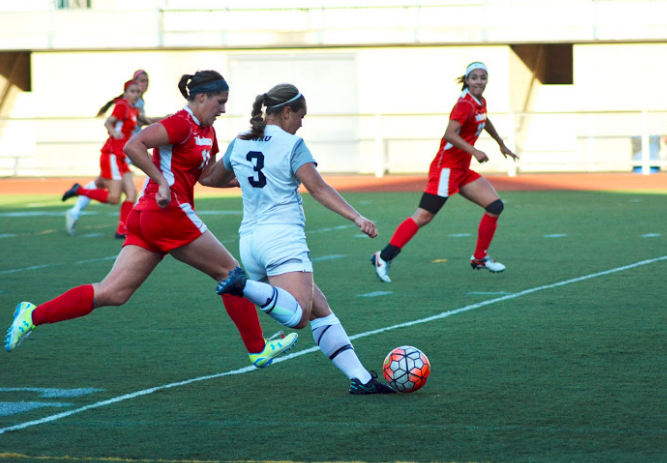 Fourth-year Amy Lindberg strikes the ball with fury during a recent match.
