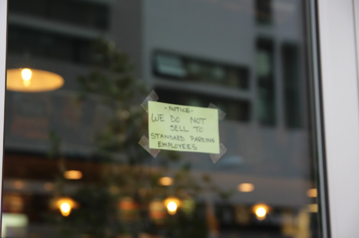 Simply Greek has a note on its window annoucing that it will not serve employees from the Standard Parking company.