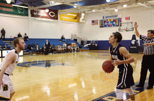 Javier Alvarez hurriedly searches for an open teammate to inbound the ball to.
