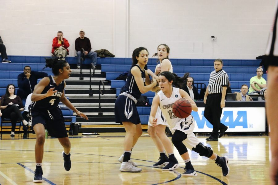Alicia Marie Gonzales drives off of a pick from a helpful teammate on her way to the basket.
