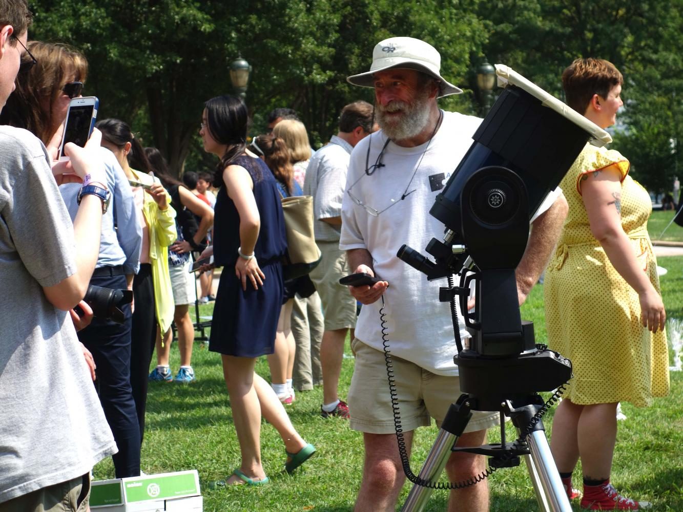 Many+viewed+the+eclipse+from+the+Warner+and+Swasey+Observatory+or+the+Kent+Hale+Smith+Oval.