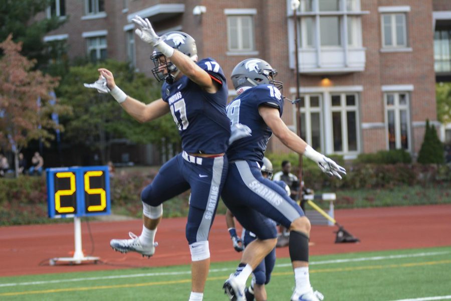 Wide+receivers+Giuseppe+Orsini+and+Joey+Spitalli+celebrate+following+a+touchdown+earlier+in+the+season.