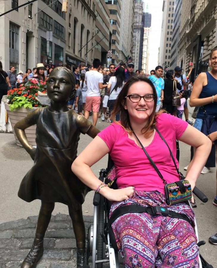 Myers posed with the Fearless Girl statue in New York City this summer.