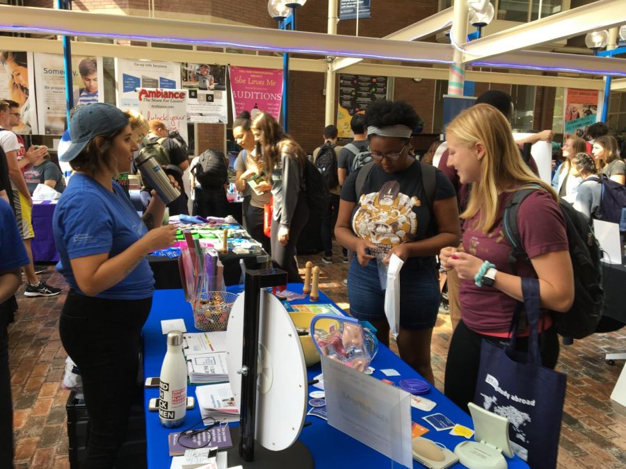 Students learn about safe sex practices at SEXPOpalooza 2019.