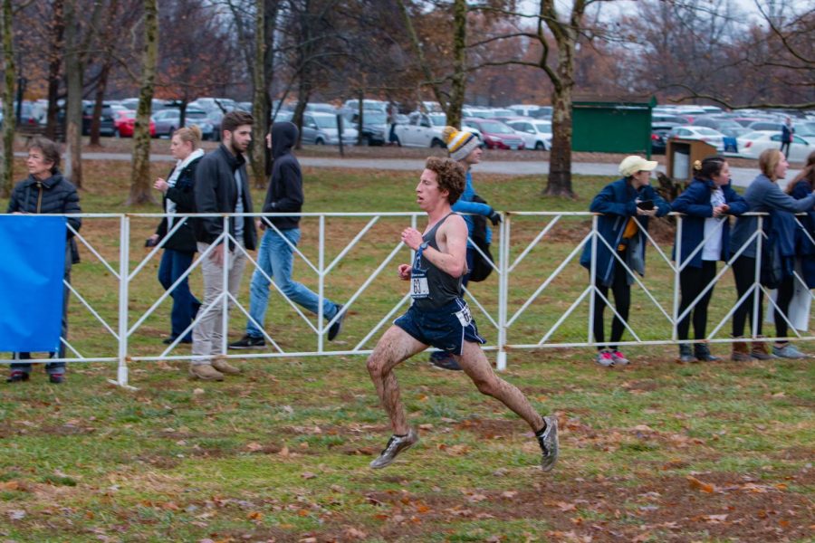 David Hall, above, and the other men’s cross country runners decreased their points by 136 points together between their first kilometer and the last.