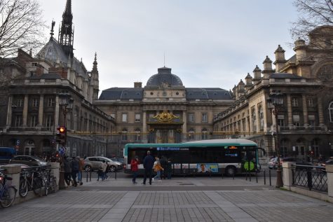 RATP Bus 21 Passes in Front of Palais de Justice de Paris. The lack of trains from the strike has left Parisian busses crowded and running off schedule as the system grapples with the longest metro strike in french history.