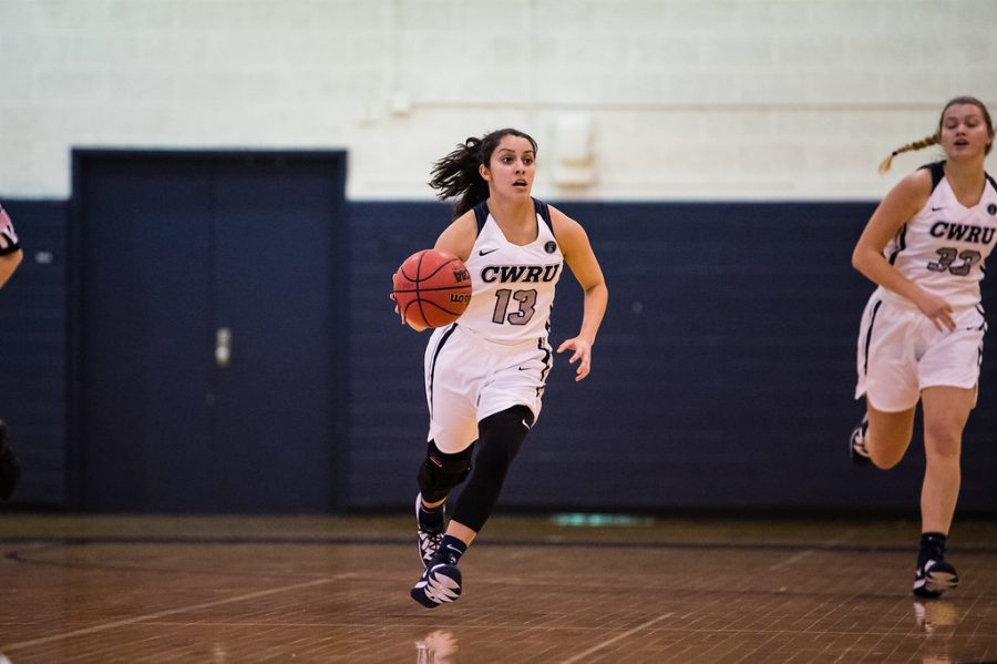 Alicia Marie Gonzales, dribbles the ball up the court against Juanita College, who CWRU beat 70-46 after a rough first quarter 
