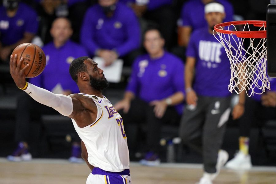 LeBron James leads The Lakers to victory in the 2020 championship, winning his fourth NBA Finals MVP award along the way, becoming the first player to win the award with three different teams.