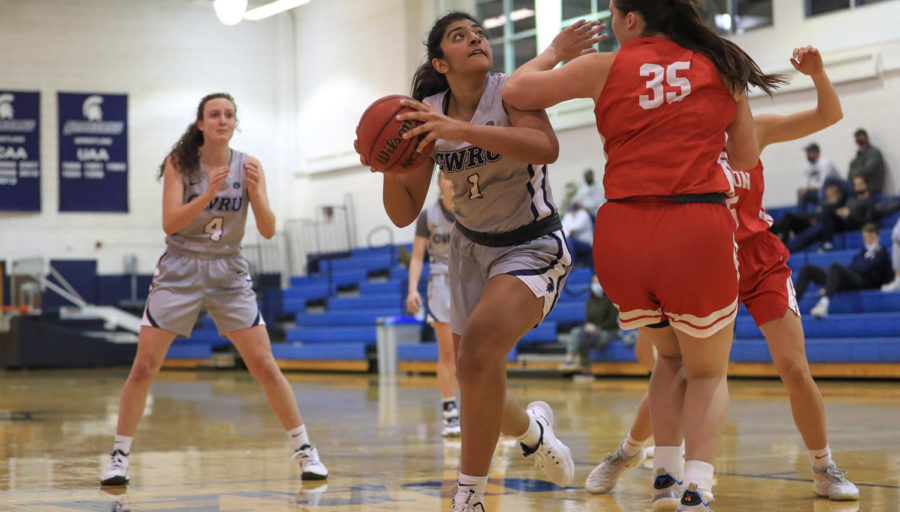 Second-year forward Preet Gill (center) scored 4 points and captured a career-high 10 rebounds in the Spartan's conference opener against Carnegie Mellon University. 