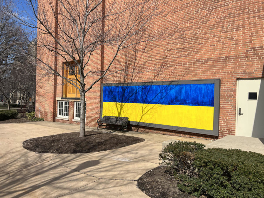 While the blue and gold stripes like at the Student Advocacy Wall (pictured) popping up across campus are a good start, students can do more to support Ukraine by engaging with aid organizations.