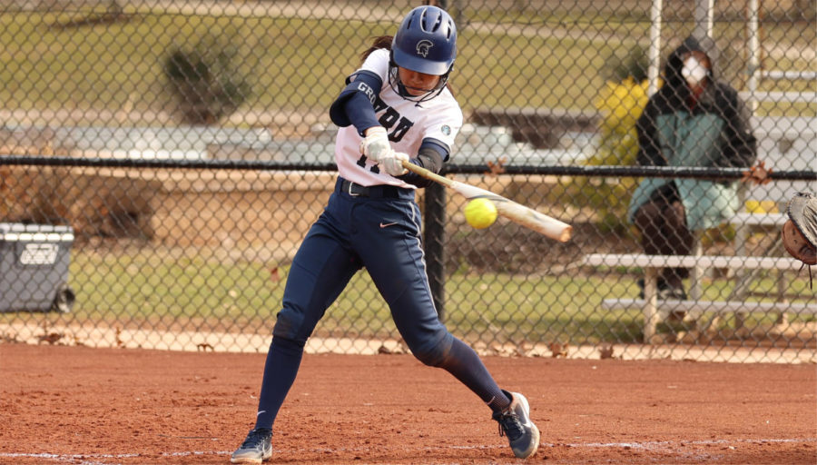 Decisive runs by second-year KaiLi Gross (above) buoyed the Spartans to victory in their matches with NYU, the latest in a series of victories for the softball team.