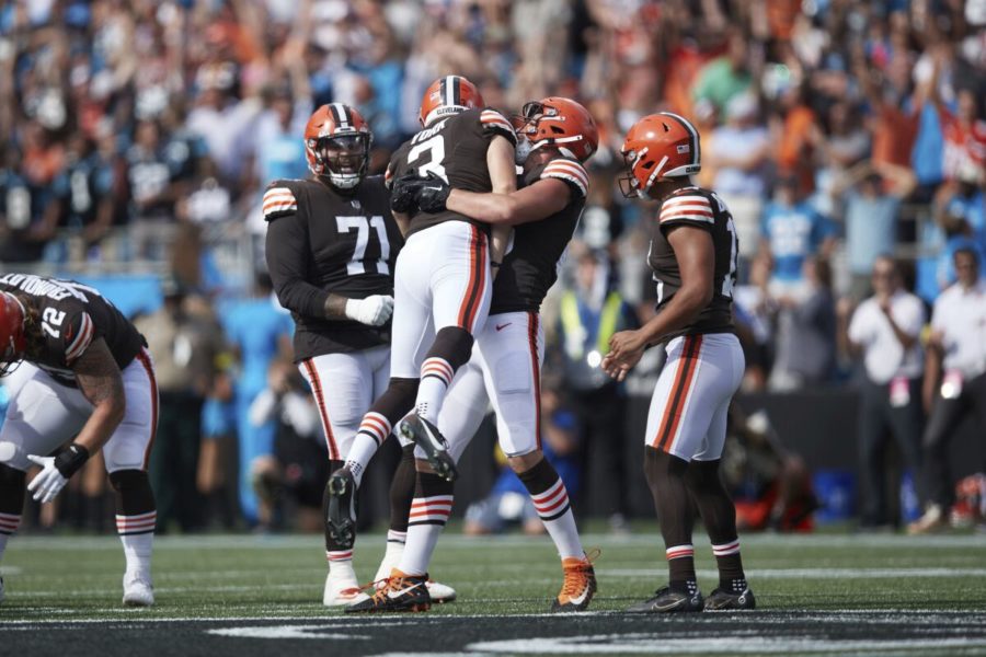 Teammates embrace Browns kicker Cade York after he carried their seasoner opener win against the Carolina Panthers.
