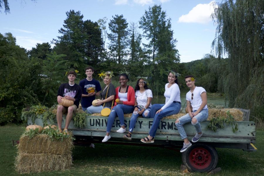 CWRU students flock towards the University Farm for a day of autum-themed activities including hayrides, smores and apple bobbing.