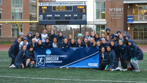 The womens soccer team poses triumphant at the second round of the NCAA Division III Championship, after defeating Ithaca College.