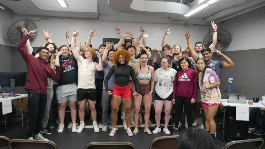 Students celebrate the inagural CWRU LIFT competition, striking various poses, including the Zyzz pose, as the successful event came to a close.