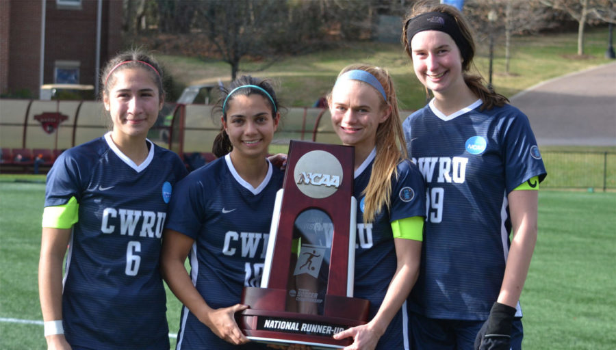 Team+captains+Lexi+Gomez%2C+Anika+Washburn%2C+Merry+Meyer+and+Elizabeth+White+%28left+to+right%29+hold+up+their+NCAA+National+Runner-up+trophy+after+a+season+full+of+new+records+and+accomplishments.