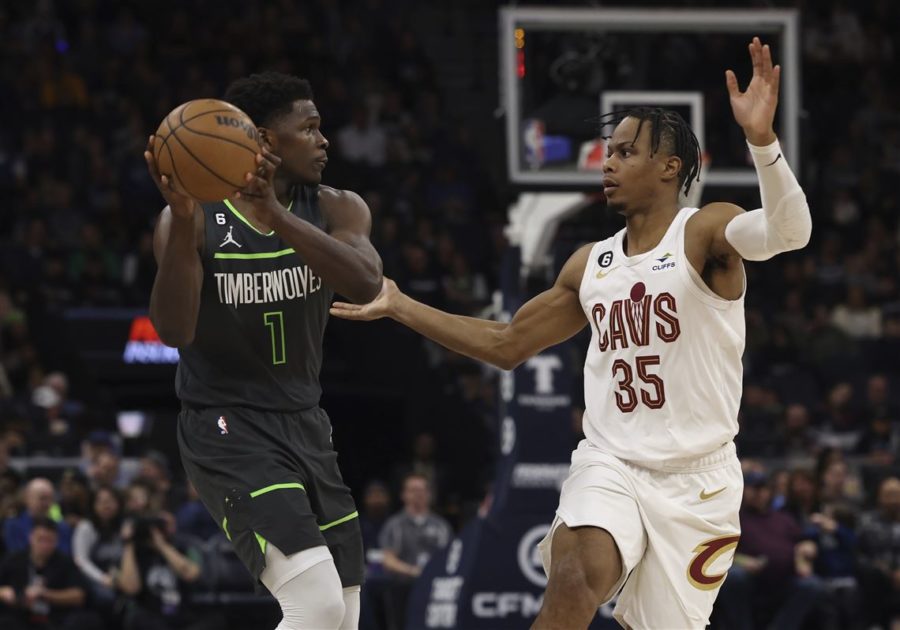 Cleveland Cavaliers shooting guard Isaac Okoro blocks Minnesota Timberwolves player Anthony Edwards in the Cavs loss on Jan. 14.