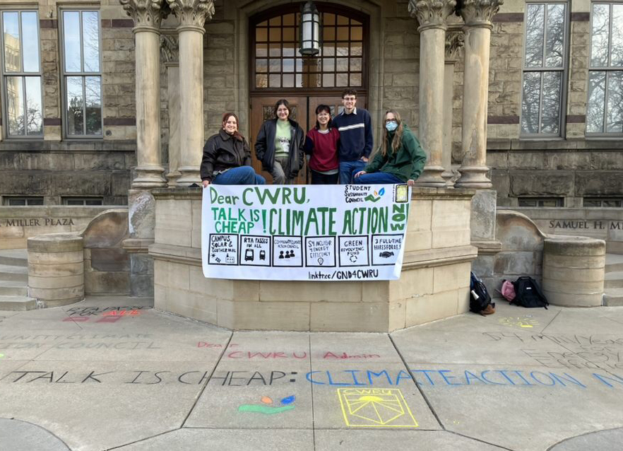 Standing+in+front+of+Adelbert+Hall%2C+members+from+the+Student+Sustainability+Council+and+Sunrise+CWRU+work+together+to+push+for+greater+administrative+efforts+in+this+fight+against+climate+change.+
