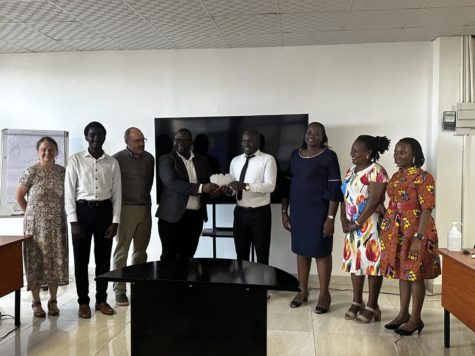 In a ceremony on March 16, GHDC handed off their reproductive health project to the NGO PATH. Representing both organizations, from left to right: Dr. Janet McGrath, Benedict Mulindwa, Dr. Andrew Rollins, Dr. Robert Ssekitoleko, Dr. Robert Mutumba, Dr. Betty Mirembe, Fiona Walugembe and Allen Namagembe.