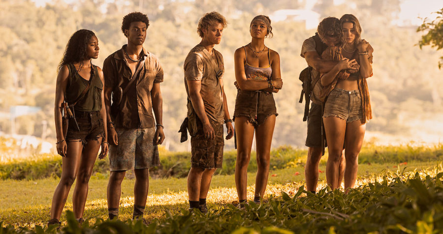 The teens of Outer Banks struggle to escape from a deserted island at the start of season three. Pictured from left to right are Cleo (Carlacia Grant), Pope (Jonathan Daviss), J.J. (Rudy Pankow), Kiara (Madison Bailey), John B. (Chase Stokes) and Sarah (Madelyn Cline).