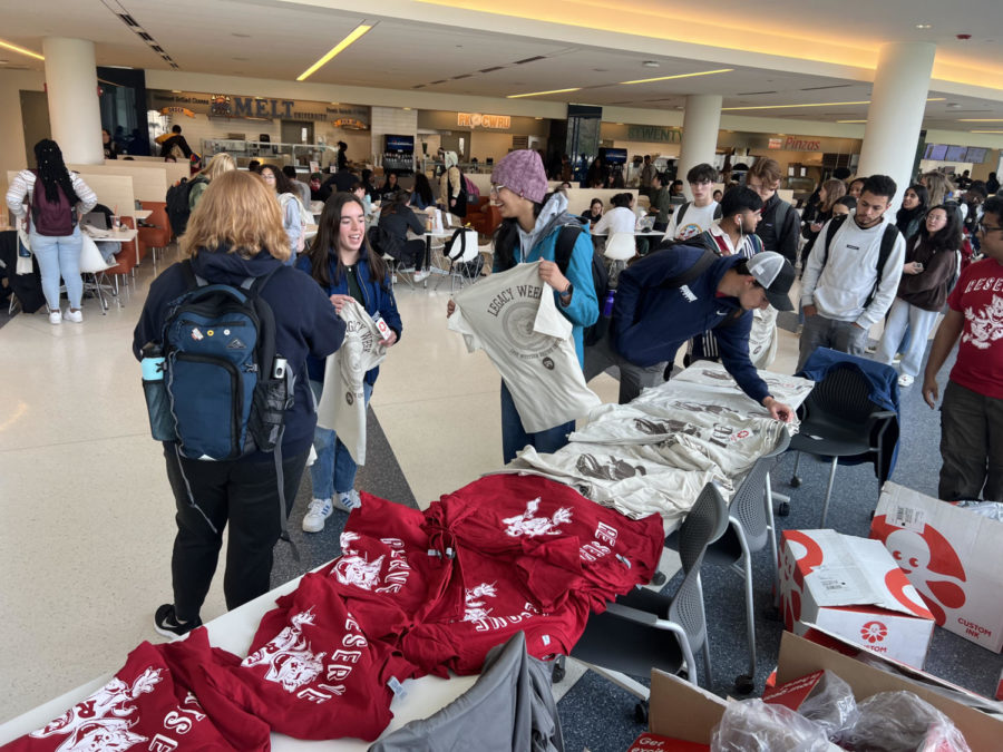 In honor of Legacy Week and the anniversary of CWRUs federation, students flocked to the Tinkham Veale University Center for their choice of either a Western Reserve Red Cat t-shirt or a Case Institute of Technology Rough Rider t-shirt.