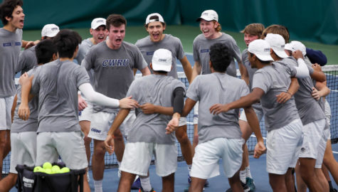 CWRUs mens tennis team celebrates after their 9-0 wins against North Central College and the University of Wisconsin-Whitewater on April 8.