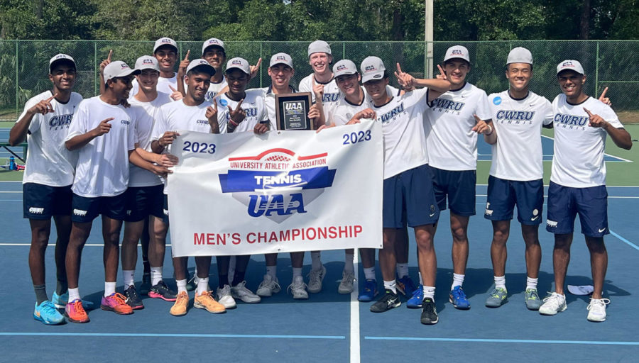 The Spartans celebrate their April 23 victory against the WashU Bears, having secured their first UAA Championship after an immensely successful season.