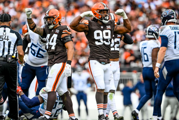Browns linebacker Sione Takitaki (44) and defensive end ZaDarius Smith (99) celebrate as the team bounces back from last weeks loss to the Steelers.