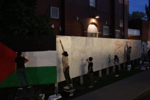 Student expression from the Gaza solidarity encampment on the Advocacy and Spirit Walls leads to administrative tension