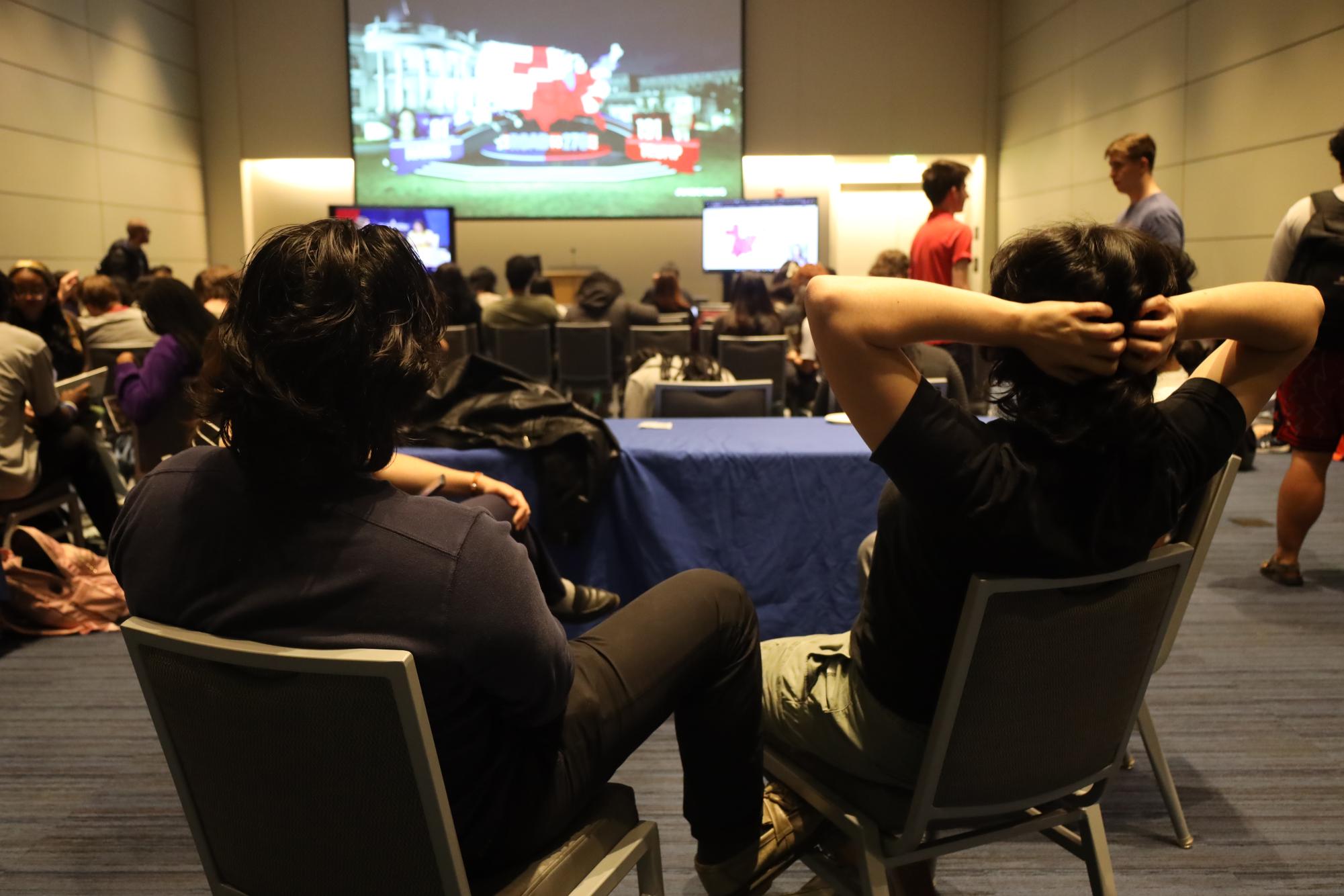 Students watch election coverage at the Joint Election Night Watch Party hosted by the Case College Republicans, Case Democrats and Department of Political Science. 